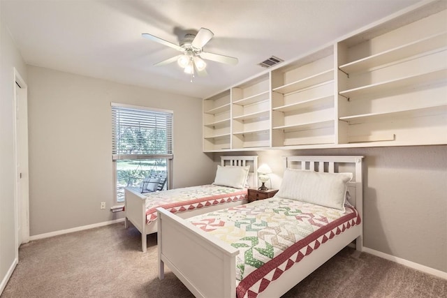 bedroom featuring carpet floors, baseboards, and ceiling fan
