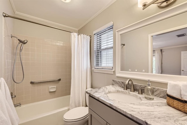bathroom with crown molding, vanity, shower / bathtub combination with curtain, and toilet