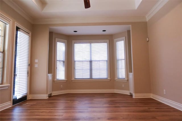 7228 Oak Shores Dr, Austin, TX 78730 - empty room featuring wood finished floors, healthy amount of natural light, ceiling fan, and crown molding