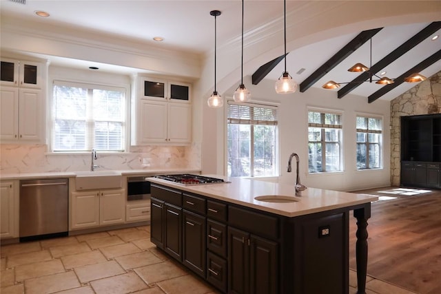 7228 Oak Shores Dr, Austin, TX 78730 - kitchen featuring stainless steel appliances, a sink, white cabinetry, and recessed lighting