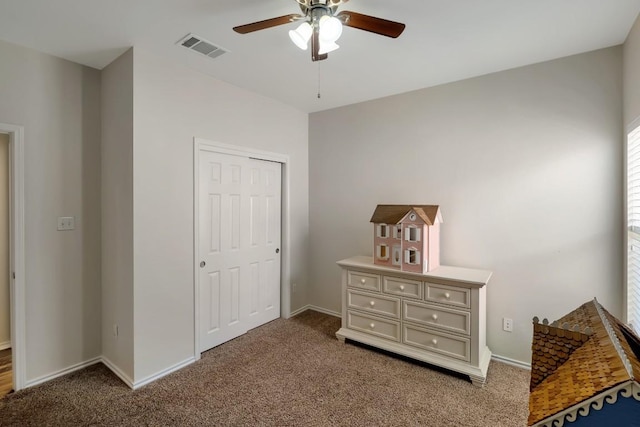 232 Housefinch Loop, Leander, TX 78641 - carpeted bedroom with a closet and ceiling fan