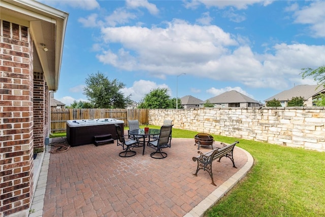 4216 Hannover Way, Round Rock, TX 78681 - view of patio / terrace featuring a fire pit and a hot tub