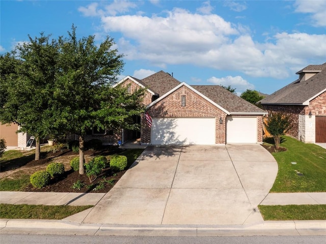 4216 Hannover Way, Round Rock, TX 78681 - view of front of property with brick siding, a garage, concrete driveway, and a front lawn