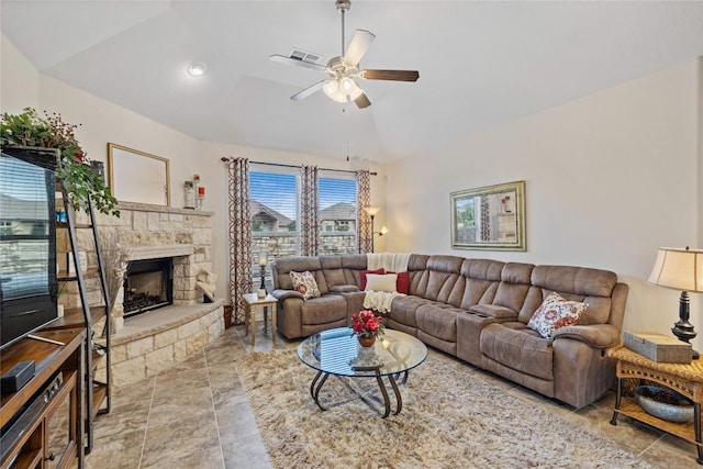 4216 Hannover Way, Round Rock, TX 78681 - living room featuring lofted ceiling, a ceiling fan, and a stone fireplace