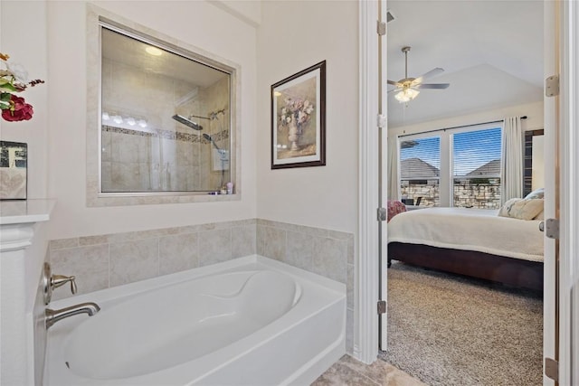 4216 Hannover Way, Round Rock, TX 78681 - bathroom with ensuite bath, a garden tub, a ceiling fan, a tile shower, and lofted ceiling