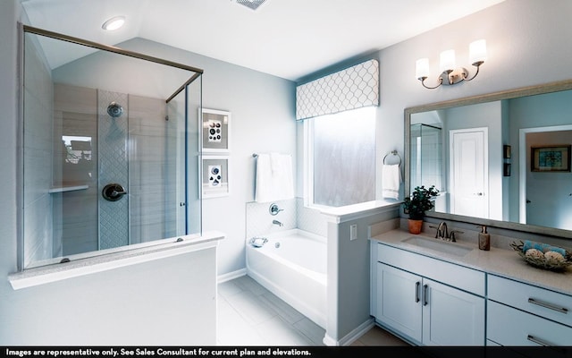 200 Hollister Dr, Liberty Hill, TX 78642 - full bathroom featuring a garden tub, a shower stall, vanity, and lofted ceiling
