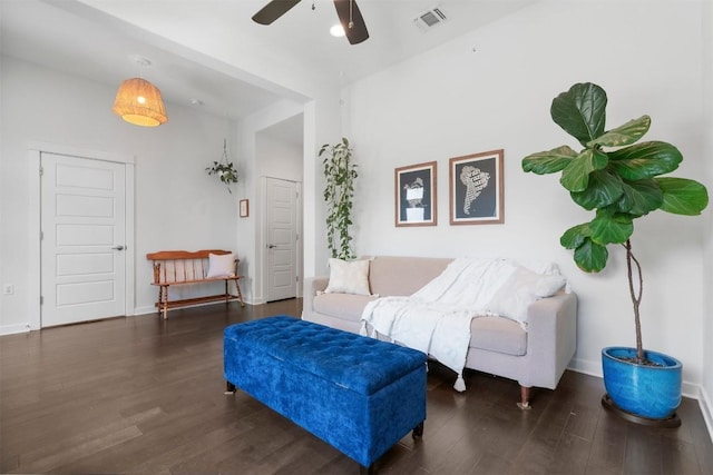 2204 Robert Browning St, Austin, TX 78723 - living area with wood finished floors, a ceiling fan, and baseboards