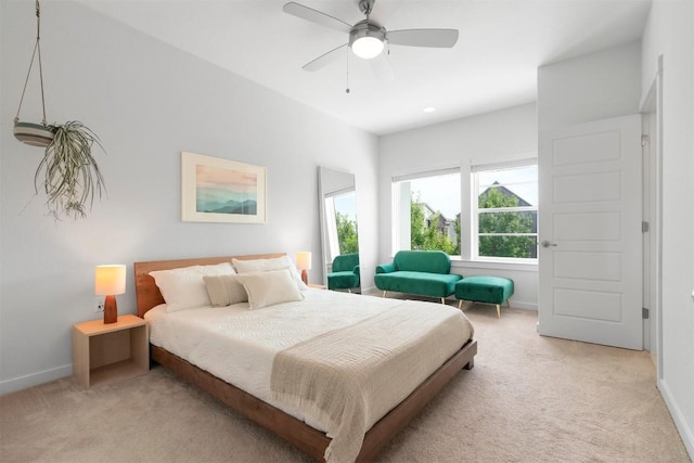 2204 Robert Browning St, Austin, TX 78723 - bedroom with light carpet, baseboards, and ceiling fan