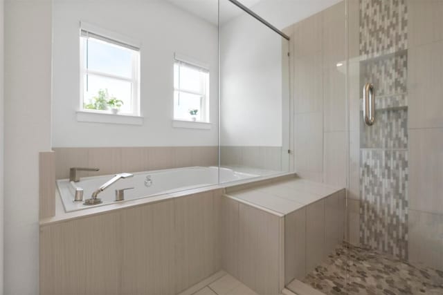 2204 Robert Browning St, Austin, TX 78723 - full bath featuring a garden tub and tiled shower