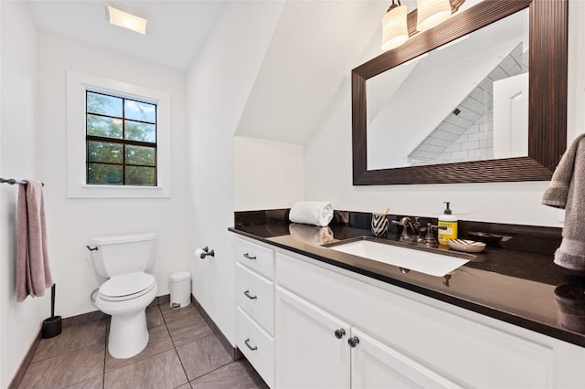 19905 Hamilton Pool Rd, Dripping Springs, TX 78620 - bathroom with vanity, toilet, baseboards, and tile patterned floors