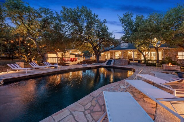 19905 Hamilton Pool Rd, Dripping Springs, TX 78620 - outdoor pool with a patio area and an outdoor fire pit