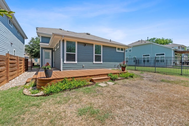 6008 Rubicon Run, Austin, TX 78745 - rear view of house with a wooden deck
