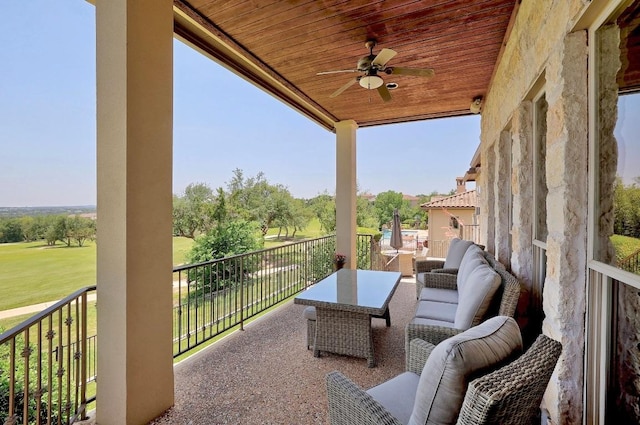 balcony featuring ceiling fan and an outdoor hangout area