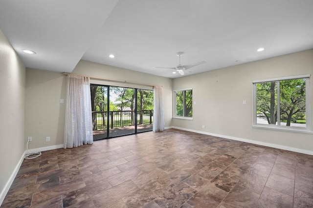 107 Phalarope Dr, Buda, TX 78610 - empty room featuring baseboards, a ceiling fan, stone finish floors, and recessed lighting
