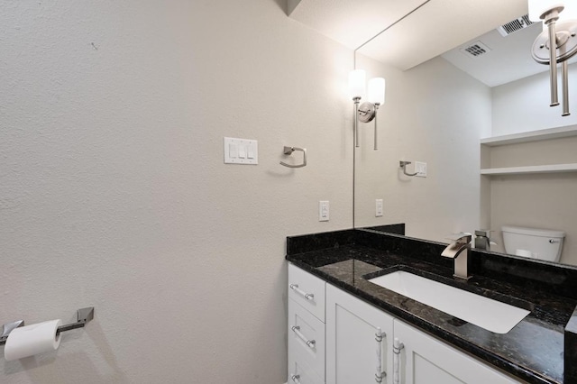 107 Phalarope Dr, Buda, TX 78610 - bathroom with vanity and toilet