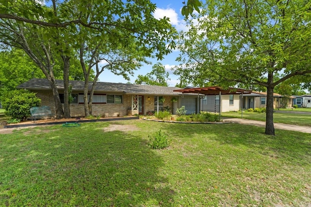 7912 Burrell Dr, Austin, TX 78757 - single story home with a garage, a front yard, driveway, and brick siding