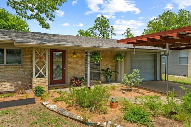 7912 Burrell Dr, Austin, TX 78757 - single story home with an attached garage, driveway, brick siding, and a shingled roof