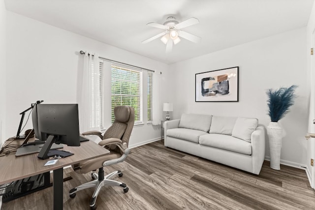 7016 Bending Oak Rd, Austin, TX 78749 - home office with baseboards, wood finished floors, and ceiling fan