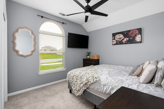 143 Dogvane Cir, Kyle, TX 78640 - bedroom with carpet floors, lofted ceiling, baseboards, and ceiling fan