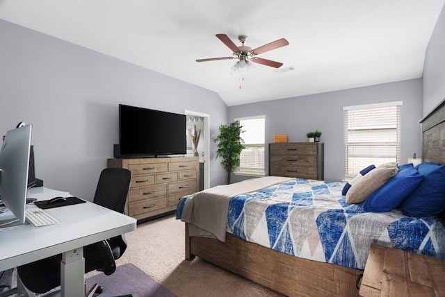 143 Dogvane Cir, Kyle, TX 78640 - bedroom featuring an office area, light colored carpet, a ceiling fan, and vaulted ceiling