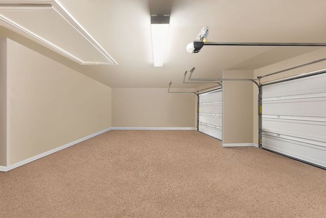 143 Dogvane Cir, Kyle, TX 78640 - garage featuring baseboards and a garage door opener