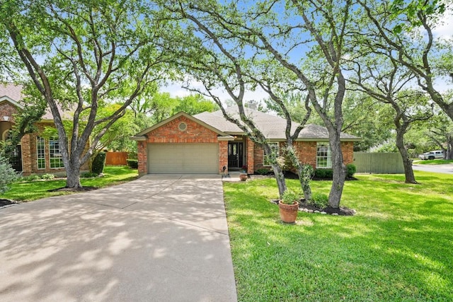 3701 Clendenin Ct, Austin, TX 78732 - ranch-style house featuring an attached garage and concrete driveway