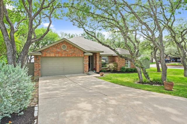 3701 Clendenin Ct, Austin, TX 78732 - ranch-style house with brick siding, driveway, an attached garage, and a front lawn