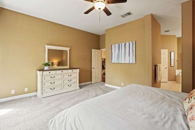 3701 Clendenin Ct, Austin, TX 78732 - carpeted bedroom featuring baseboards, a ceiling fan, and ensuite bath