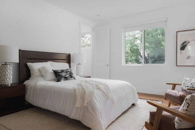 1800 Bay Hill Dr, Austin, TX 78746 - bedroom featuring baseboards and wood finished floors