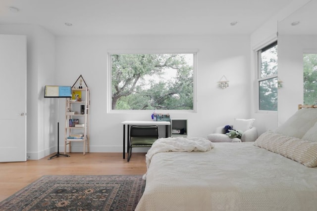 1800 Bay Hill Dr, Austin, TX 78746 - bedroom featuring wood finished floors and recessed lighting
