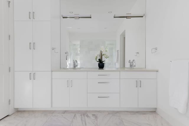 1800 Bay Hill Dr, Austin, TX 78746 - full bath featuring double vanity, marble look tiles, and a shower