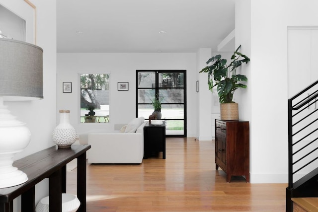 1800 Bay Hill Dr, Austin, TX 78746 - living area featuring light wood finished floors and stairs