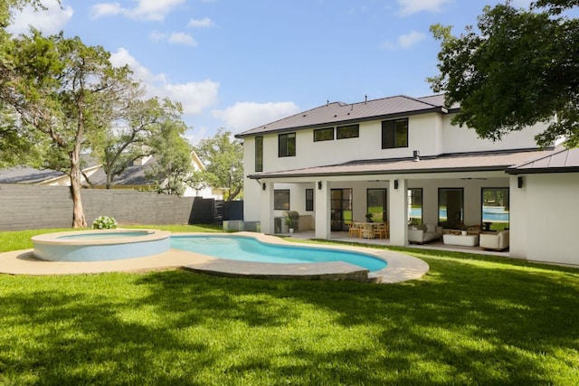1800 Bay Hill Dr, Austin, TX 78746 - back of house with an outdoor hangout area, stucco siding, metal roof, a patio, and a standing seam roof