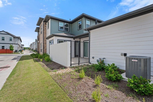 3109 Sorin St, Austin, TX 78723 - rear view of house featuring cooling unit and fence