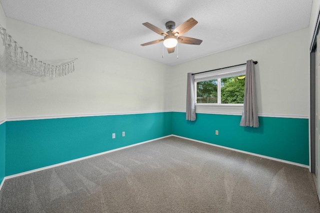 13018 Garfield Ln, Austin, TX 78727 - carpeted empty room featuring ceiling fan, a textured ceiling, and baseboards