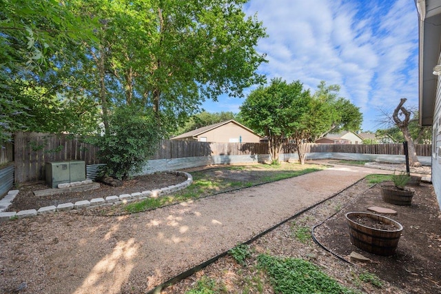 fenced backyard featuring a patio