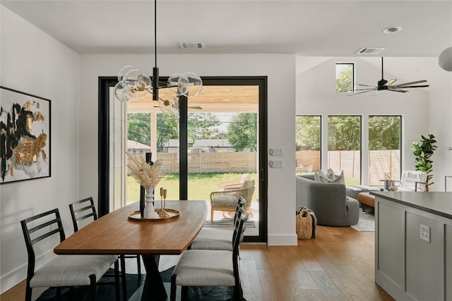 5805 Mojave Dr, Austin, TX 78745 - dining space featuring plenty of natural light, light wood-style floors, ceiling fan, a chandelier, and recessed lighting