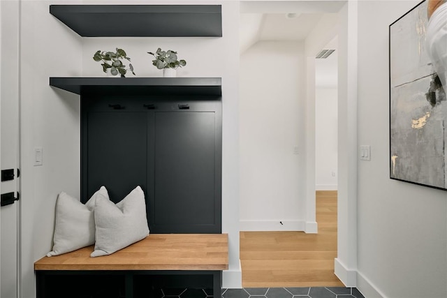 5805 Mojave Dr, Austin, TX 78745 - mudroom featuring baseboards and wood finished floors