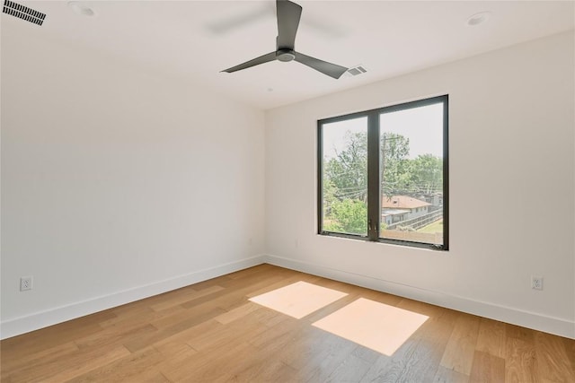 5805 Mojave Dr, Austin, TX 78745 - spare room featuring baseboards, light wood-style floors, and ceiling fan
