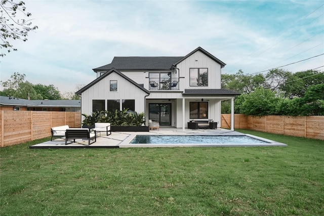 5805 Mojave Dr, Austin, TX 78745 - back of house with an outdoor hangout area, a balcony, board and batten siding, a patio area, and roof with shingles