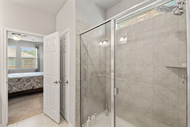 537 Appalachian Trl, Leander, TX 78641 - full bath with connected bathroom, a shower stall, tile patterned flooring, and ceiling fan