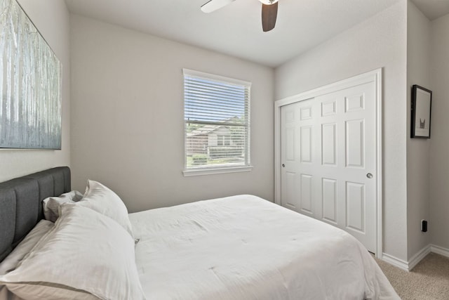 537 Appalachian Trl, Leander, TX 78641 - bedroom featuring carpet floors, a closet, baseboards, and a ceiling fan