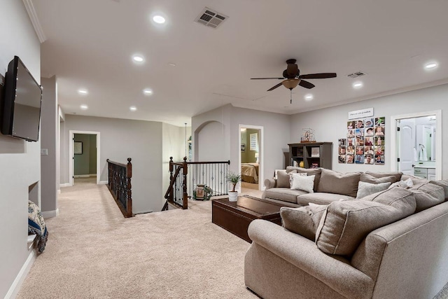 2516 Arion Cir, Austin, TX 78730 - living room featuring light colored carpet, recessed lighting, ceiling fan, ornamental molding, and baseboards