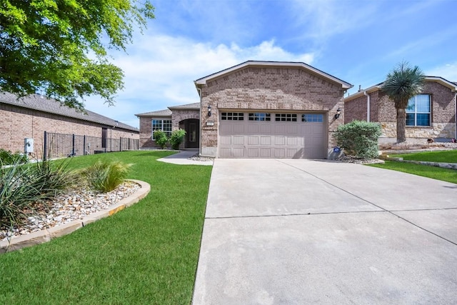 111 Bear Creek Ln, Georgetown, TX 78633 - ranch-style home with brick siding, a garage, and concrete driveway