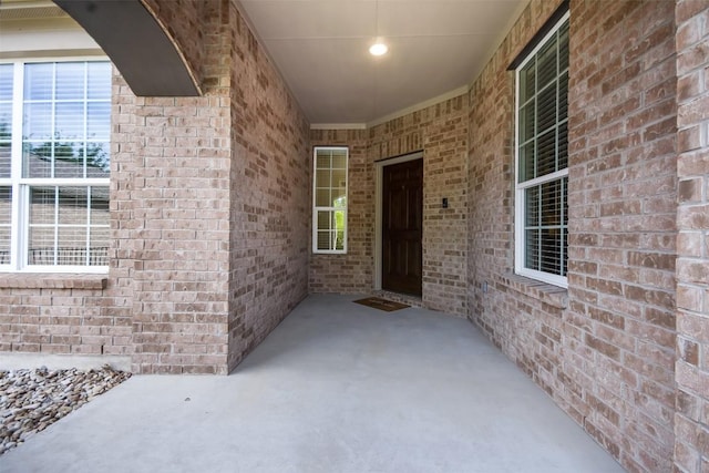 111 Bear Creek Ln, Georgetown, TX 78633 - property entrance featuring brick siding and a patio area