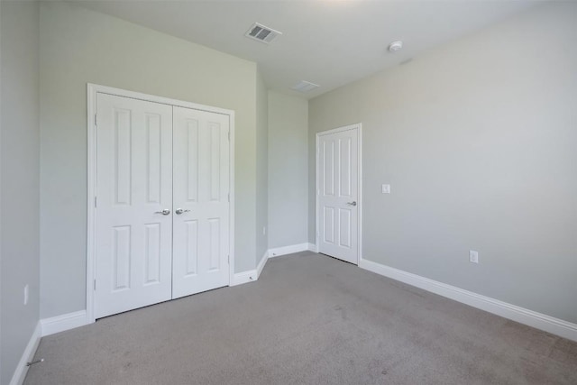 111 Bear Creek Ln, Georgetown, TX 78633 - unfurnished bedroom featuring carpet flooring, baseboards, and a closet