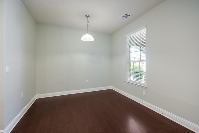 111 Bear Creek Ln, Georgetown, TX 78633 - unfurnished room with dark wood-type flooring and baseboards