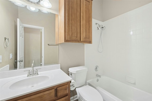 bathroom featuring toilet, vanity, and shower / bathtub combination