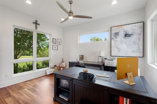 908 Cypress Grove Dr, Austin, TX 78732 - home office featuring wood finished floors, ceiling fan, and recessed lighting