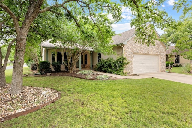 258 Whispering Wind Dr, Georgetown, TX 78633 - obstructed view of property featuring a garage, driveway, brick siding, and a front lawn